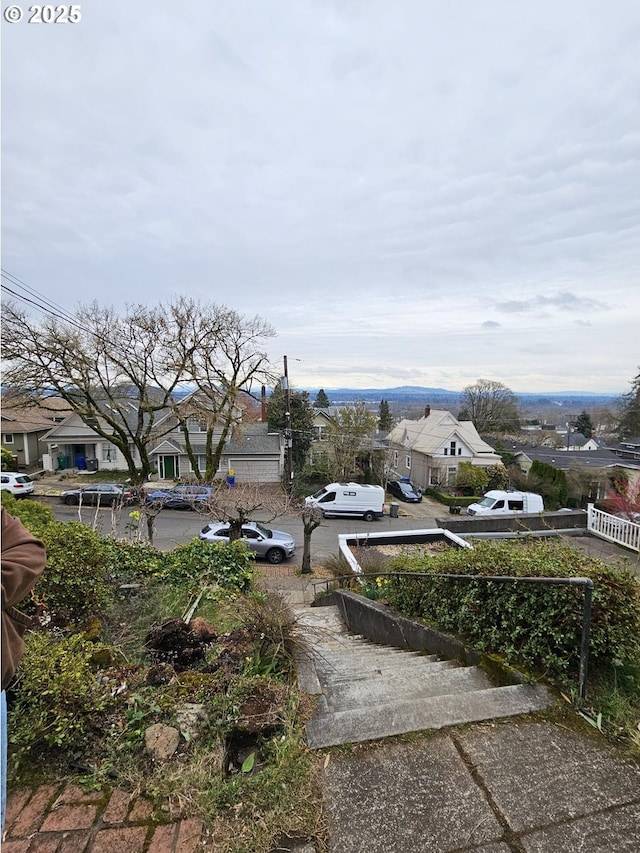 view of yard featuring a residential view