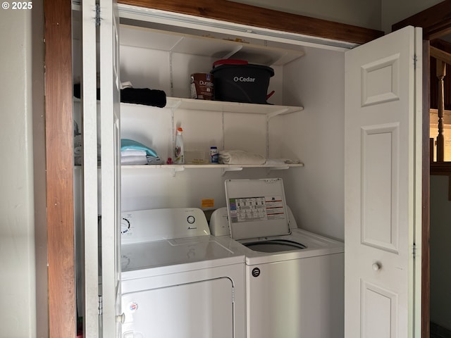 clothes washing area with independent washer and dryer