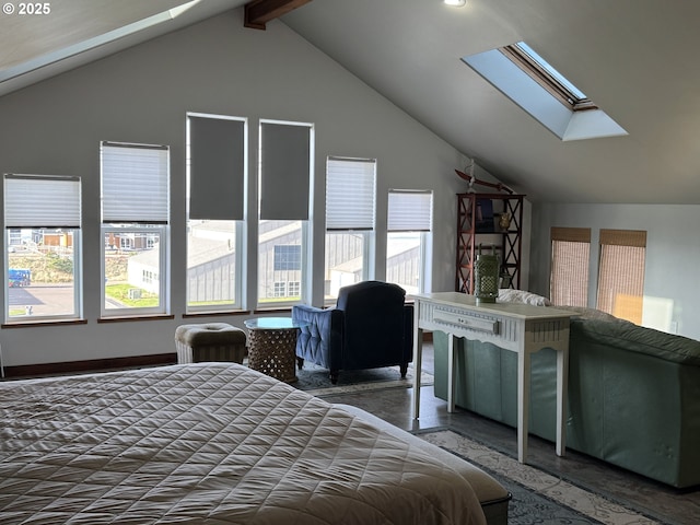 bedroom featuring vaulted ceiling with skylight