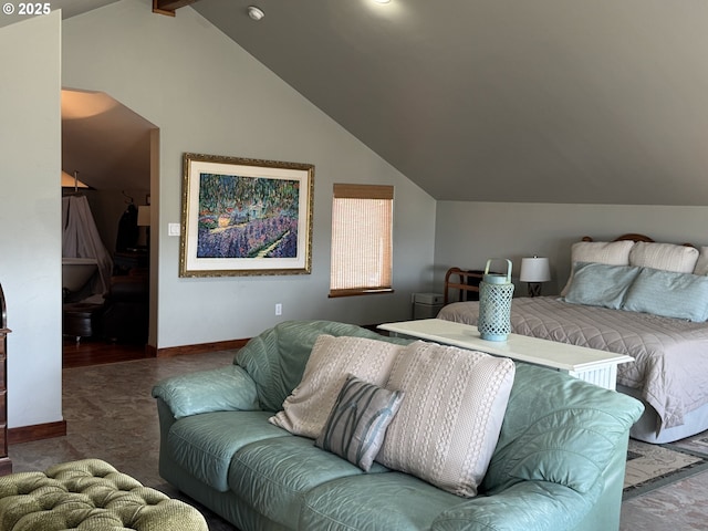 bedroom featuring vaulted ceiling and carpet floors