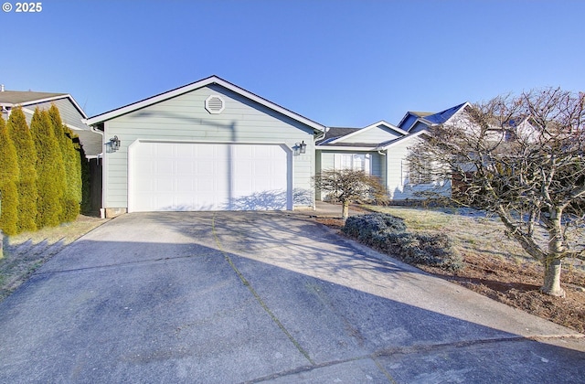 ranch-style home featuring a garage