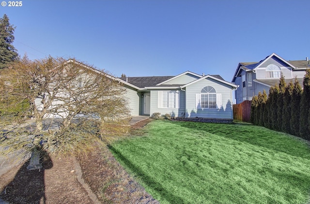 view of front facade with a front lawn