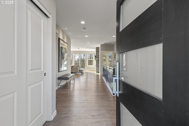 hallway featuring hardwood / wood-style flooring