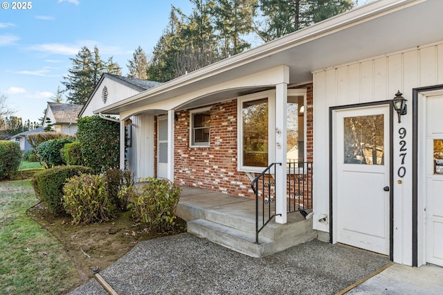 doorway to property with a porch