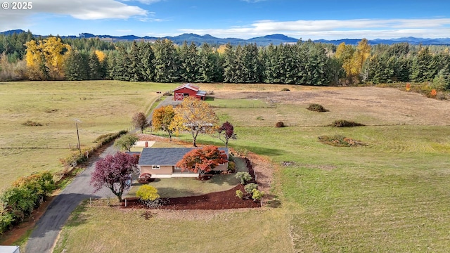 bird's eye view featuring a mountain view and a rural view