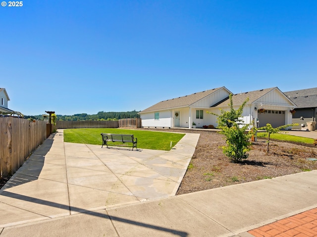 1793 SE Jonathan Ave, Dallas, OR 97338 - view of patio with an attached garage