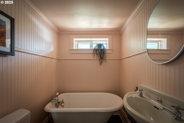 5616 N Campbell Ave, Portland, OR 97217 - full bathroom featuring a soaking tub, healthy amount of natural light, toilet, a sink, and crown molding