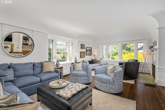 2424 NW Northrup St, Portland, OR 97210 - living room featuring wood finished floors, healthy amount of natural light, and a fireplace