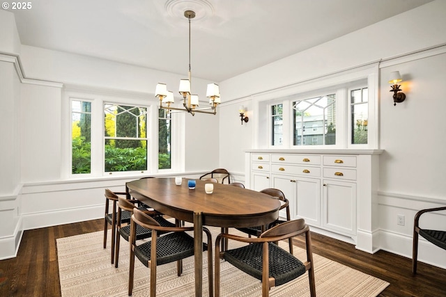 2424 NW Northrup St, Portland, OR 97210 - dining room with a chandelier, plenty of natural light, and dark wood-type flooring