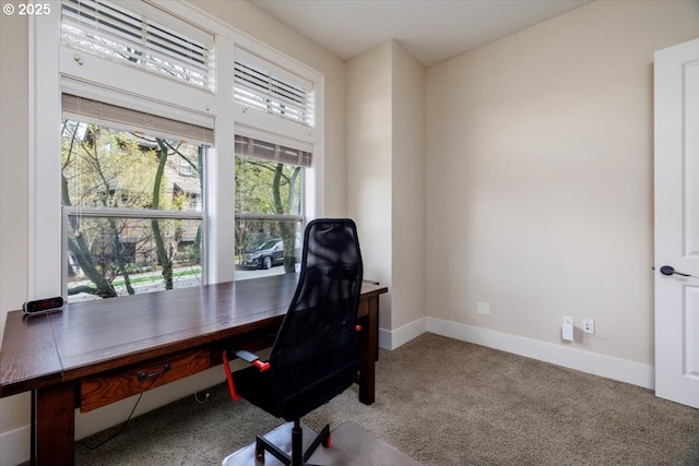 office with carpet flooring and baseboards