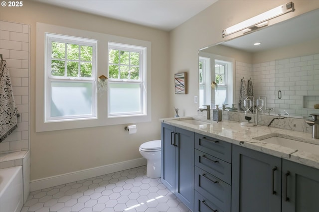 full bathroom with baseboards, toilet, tile patterned floors, double vanity, and a shower