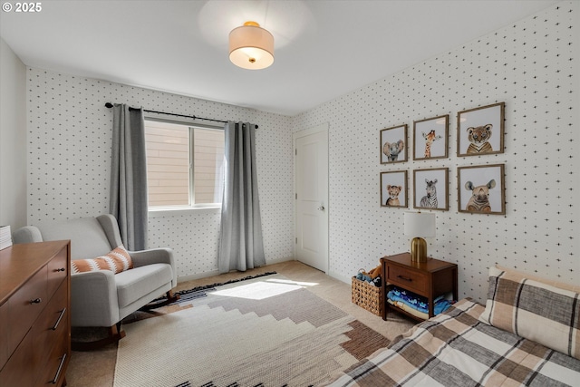 bedroom with carpet and wallpapered walls
