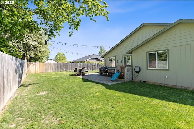 view of yard featuring a fenced backyard and a patio