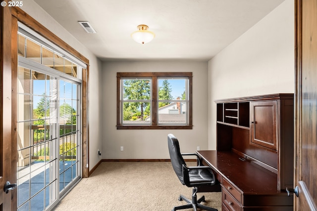 8585 NW Copeland St, Portland, OR 97229 - office area with healthy amount of natural light, light carpet, and baseboards