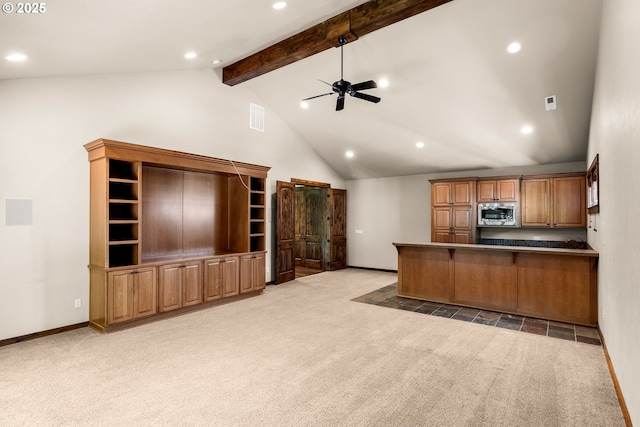 8585 NW Copeland St, Portland, OR 97229 - kitchen with stainless steel microwave, light colored carpet, recessed lighting, a ceiling fan, and baseboards