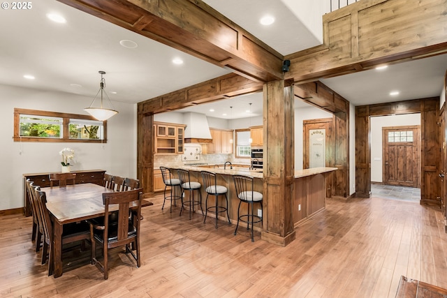 8585 NW Copeland St, Portland, OR 97229 - dining space featuring light wood-style floors, baseboards, and recessed lighting