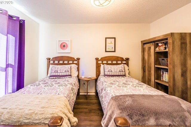 105 Sijota St, Gleneden Beach, OR 97388 - bedroom with dark wood-style floors