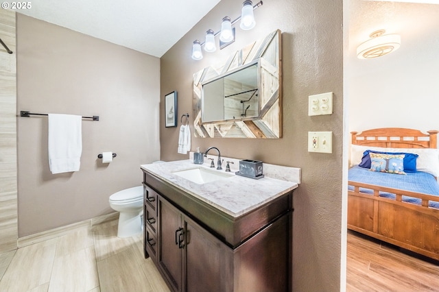 105 Sijota St, Gleneden Beach, OR 97388 - ensuite bathroom with connected bathroom, toilet, baseboards, and vanity