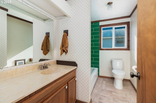 full bathroom with toilet, wallpapered walls, vanity, and baseboards