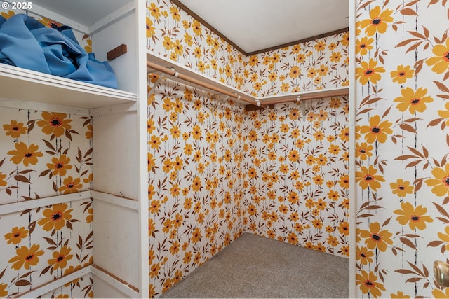 bathroom with wallpapered walls