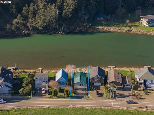 bird's eye view with a water view and a residential view