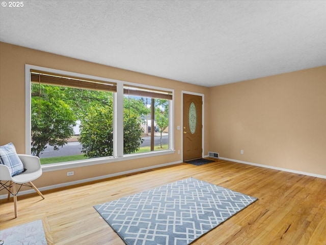 4501 NW Washington St, Vancouver, WA 98663 - entryway featuring baseboards and wood finished floors