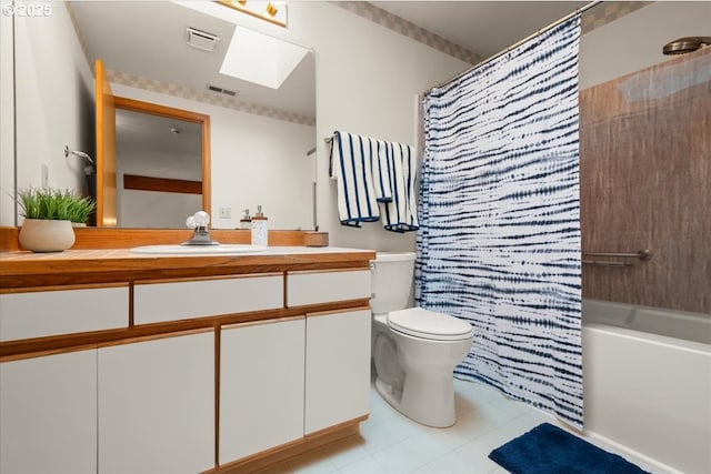 5002 SW Vacuna St, Portland, OR 97219 - full bath featuring vanity, a skylight, toilet, shower / bath combo with shower curtain, and tile patterned floors
