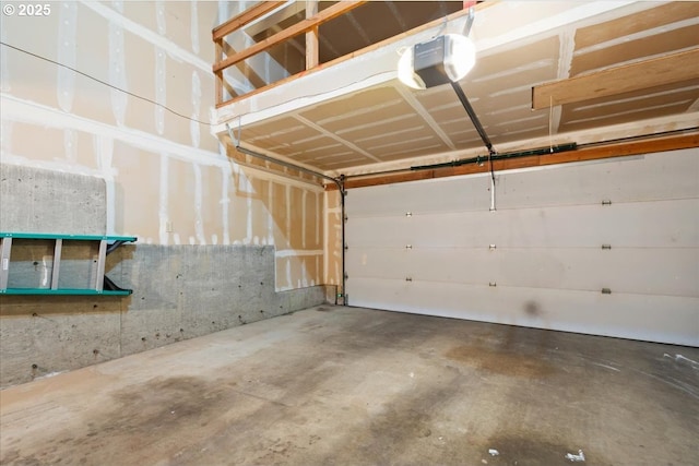 5002 SW Vacuna St, Portland, OR 97219 - garage featuring a garage door opener