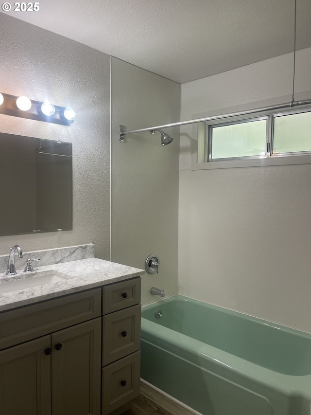 full bathroom with tub / shower combination and vanity
