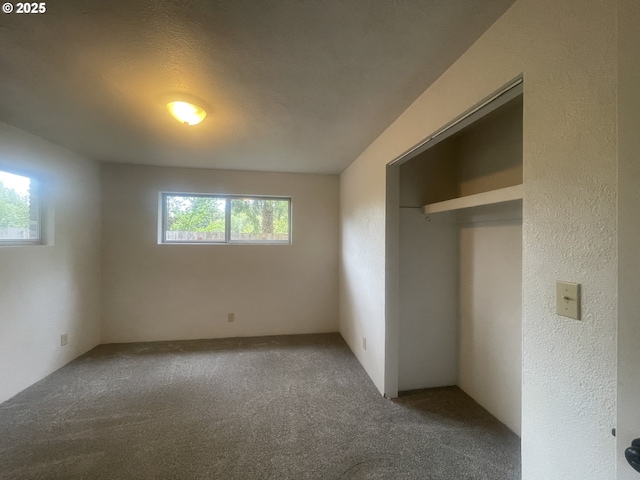 unfurnished bedroom featuring carpet floors