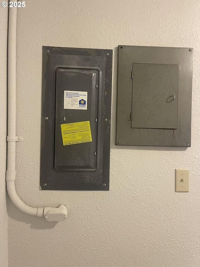 utility room featuring electric panel