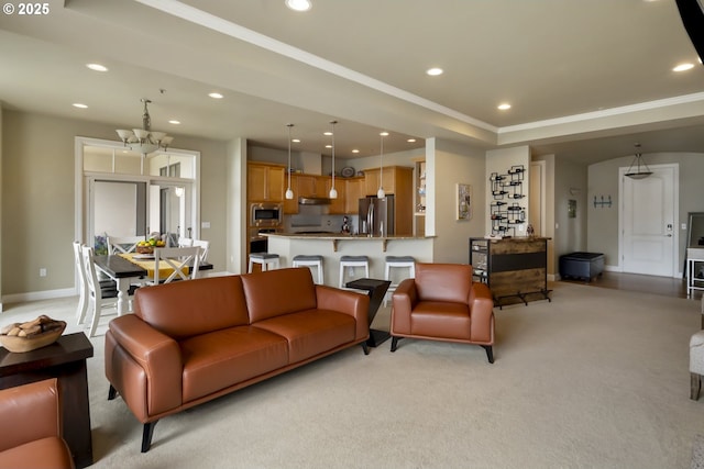 707 N Hayden Island Dr Unit 413, Portland, OR 97217 - living area with recessed lighting, light colored carpet, and ornamental molding