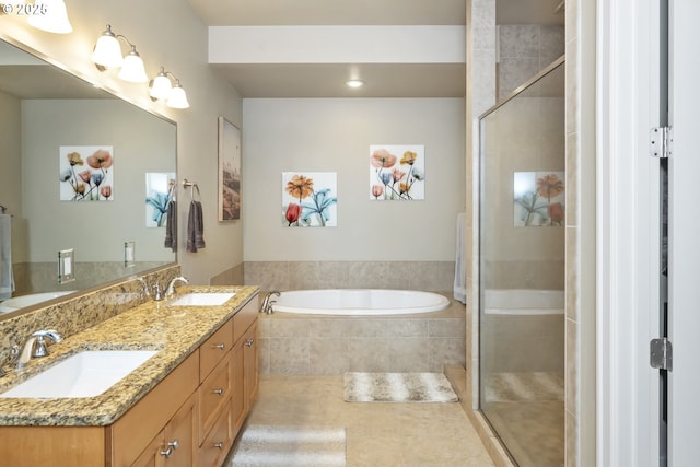 707 N Hayden Island Dr Unit 413, Portland, OR 97217 - bathroom featuring a garden tub, a sink, and a stall shower