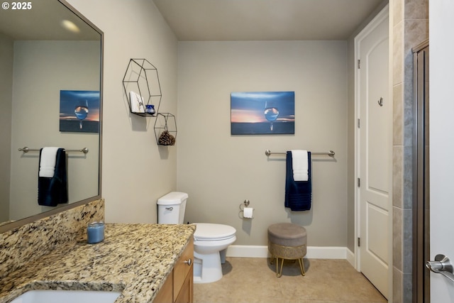707 N Hayden Island Dr Unit 413, Portland, OR 97217 - full bathroom with toilet, a shower with door, vanity, and baseboards
