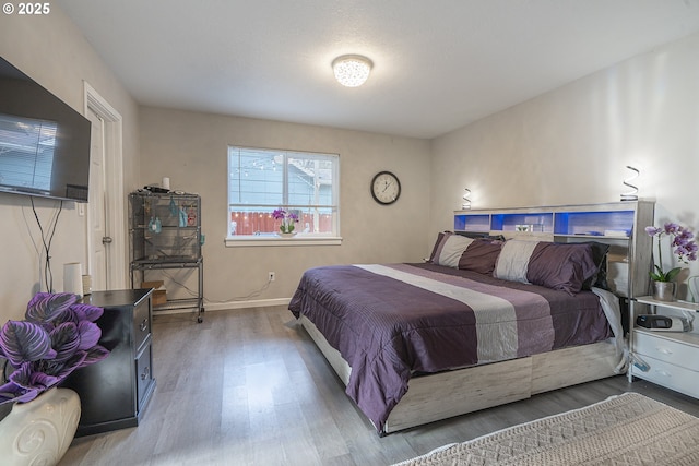 bedroom featuring hardwood / wood-style flooring