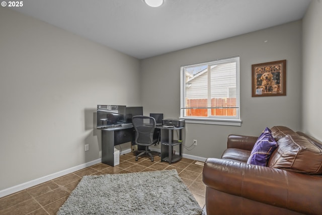 home office with dark tile patterned flooring