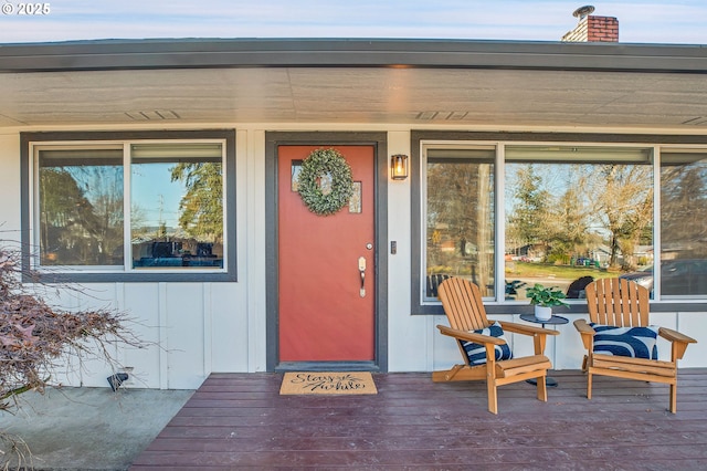 doorway to property with covered porch