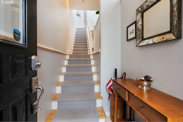 entryway featuring stairs