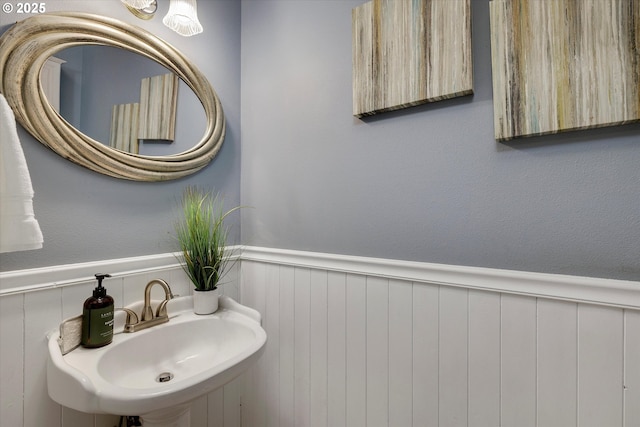 18211 NE 32nd St, Vancouver, WA 98682 - bathroom featuring wainscoting and a sink