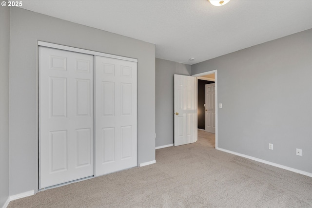 18211 NE 32nd St, Vancouver, WA 98682 - unfurnished bedroom with a closet, baseboards, and carpet