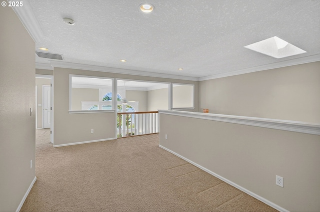 21401 NE Shore Dr, Fairview, OR 97024 - corridor featuring a skylight, crown molding, carpet floors, a textured ceiling, and recessed lighting