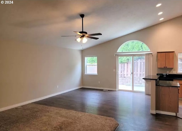unfurnished living room featuring ceiling fan, recessed lighting, baseboards, and vaulted ceiling