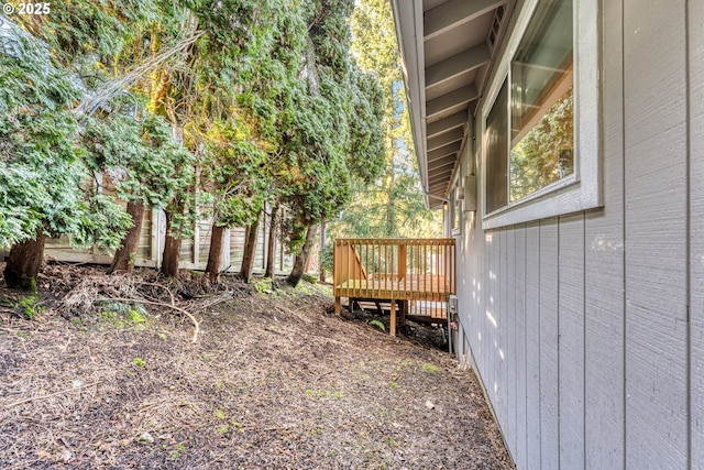 view of yard with a deck