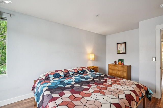 16040 SW Audubon St Unit 101, Beaverton, OR 97003 - bedroom featuring wood finished floors and baseboards