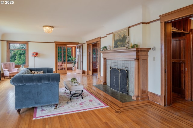 1343 Jerome Ave, Astoria, OR 97103 - living room featuring hardwood / wood-style flooring and a fireplace