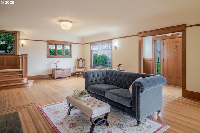 1343 Jerome Ave, Astoria, OR 97103 - living area with light wood-style floors and stairway