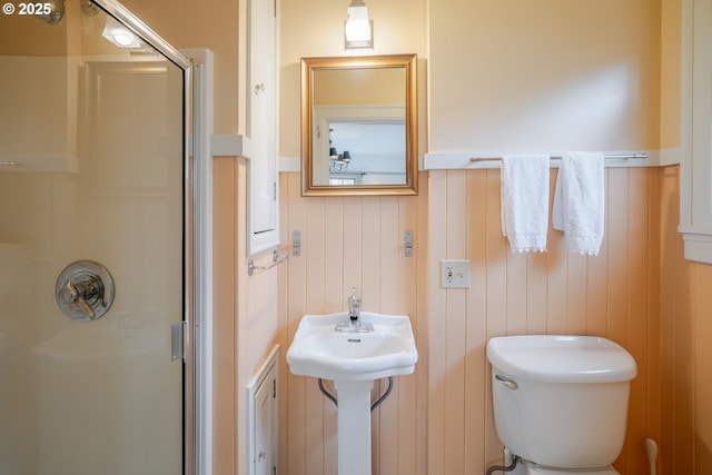 1343 Jerome Ave, Astoria, OR 97103 - full bath with a shower stall and a wainscoted wall