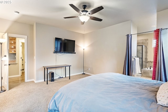 carpeted bedroom with a ceiling fan and baseboards