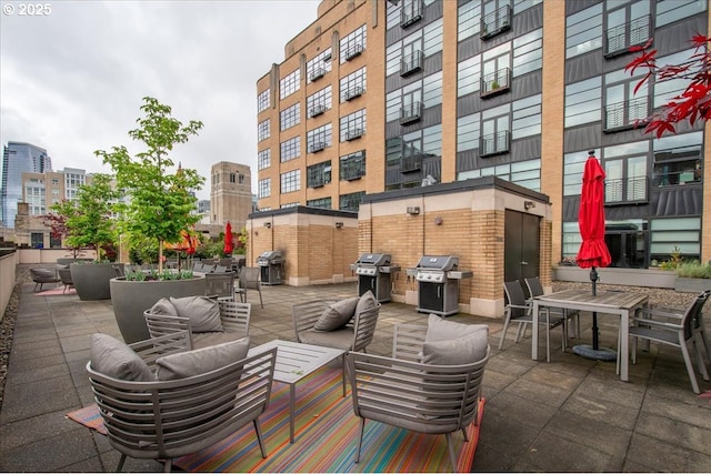 view of patio / terrace with a grill and outdoor lounge area