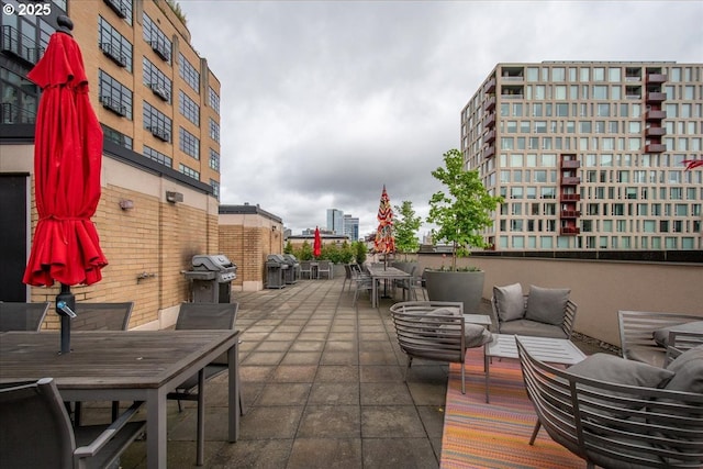 view of patio / terrace featuring area for grilling and outdoor lounge area